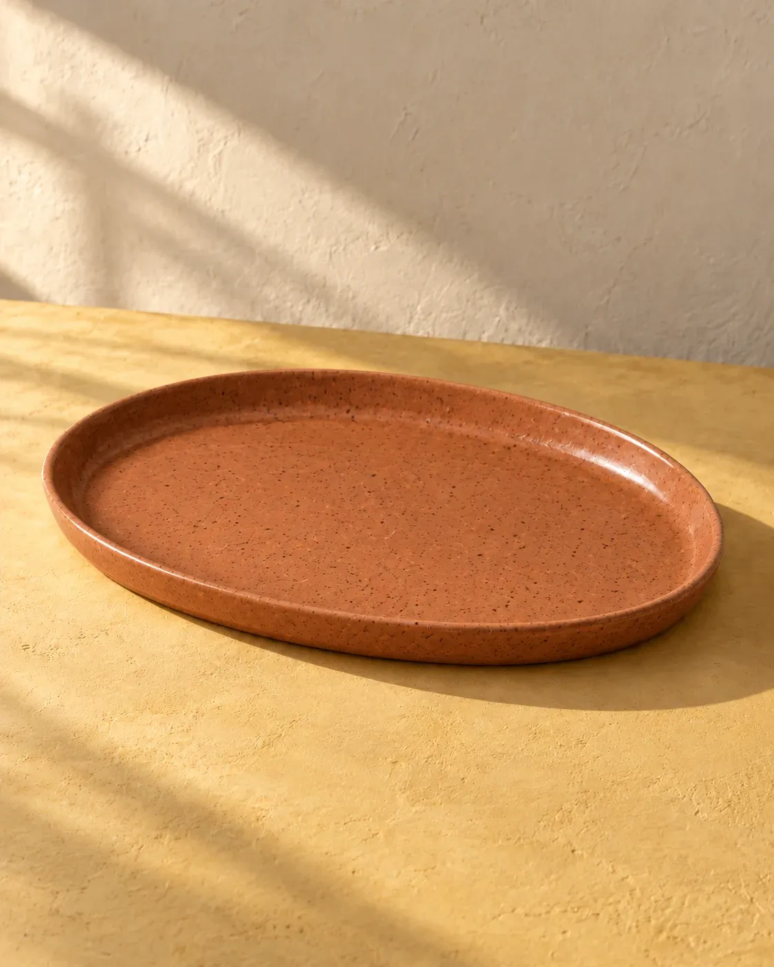 Oval Platter in Clay, a muted terracotta glaze