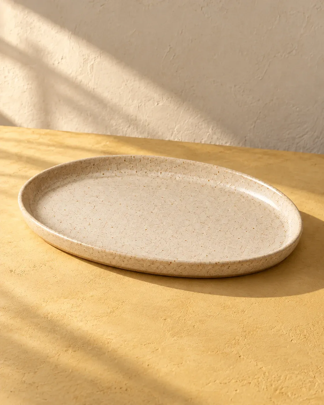 Oval Platter in Oat, a warm pale glaze